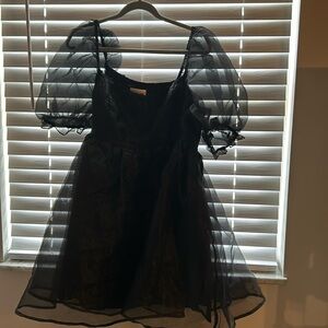 Black Francesca’s Audrey parks collection. Mini dress. Puffy dress. Girly dress